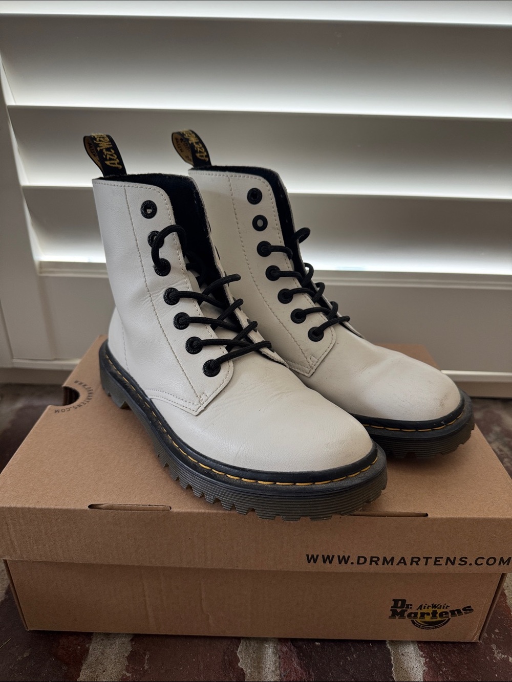 Dr. Martens White Leather Lug Sole Boots with Black Trim